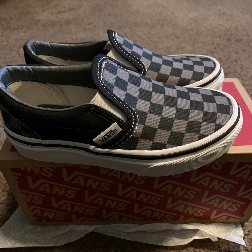 Brand new Kids Slip-on Vans size 11.
